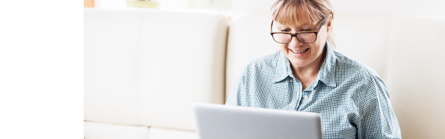 Woman smiling with laptop